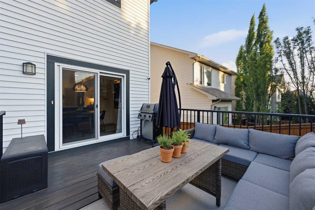 92 Heritage Hill, Cochrane, AB - Outdoor With Deck Patio Veranda With Exterior