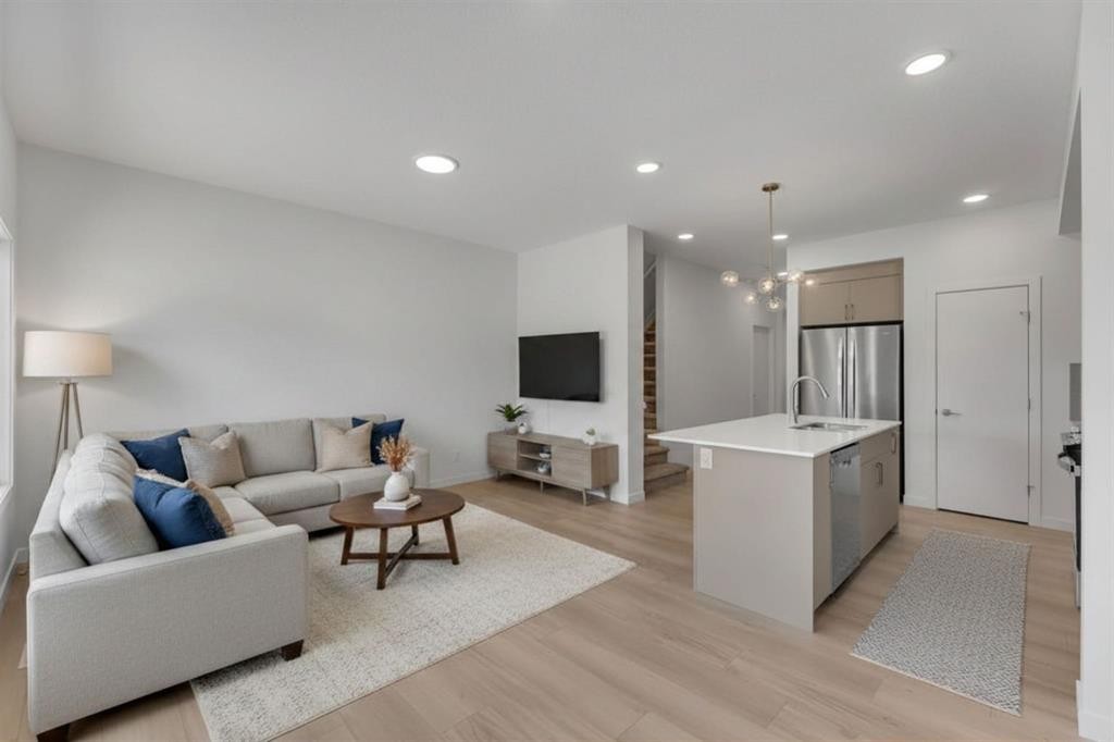 7 Heritage Heath, Cochrane, AB - Indoor Photo Showing Living Room