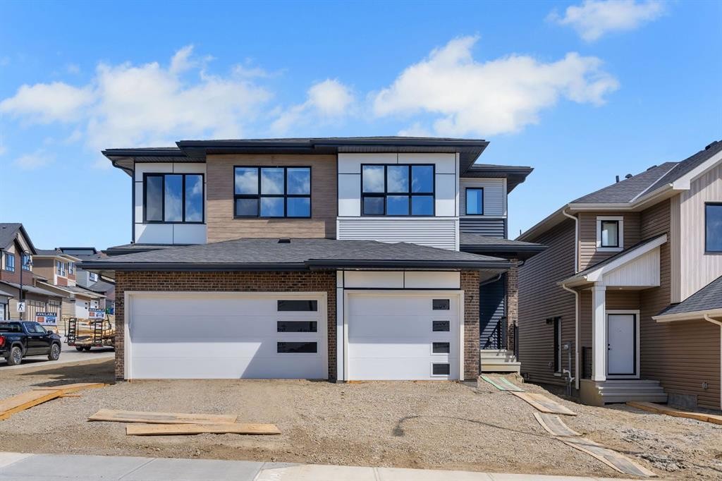 7 Heritage Heath, Cochrane, AB - Outdoor With Facade