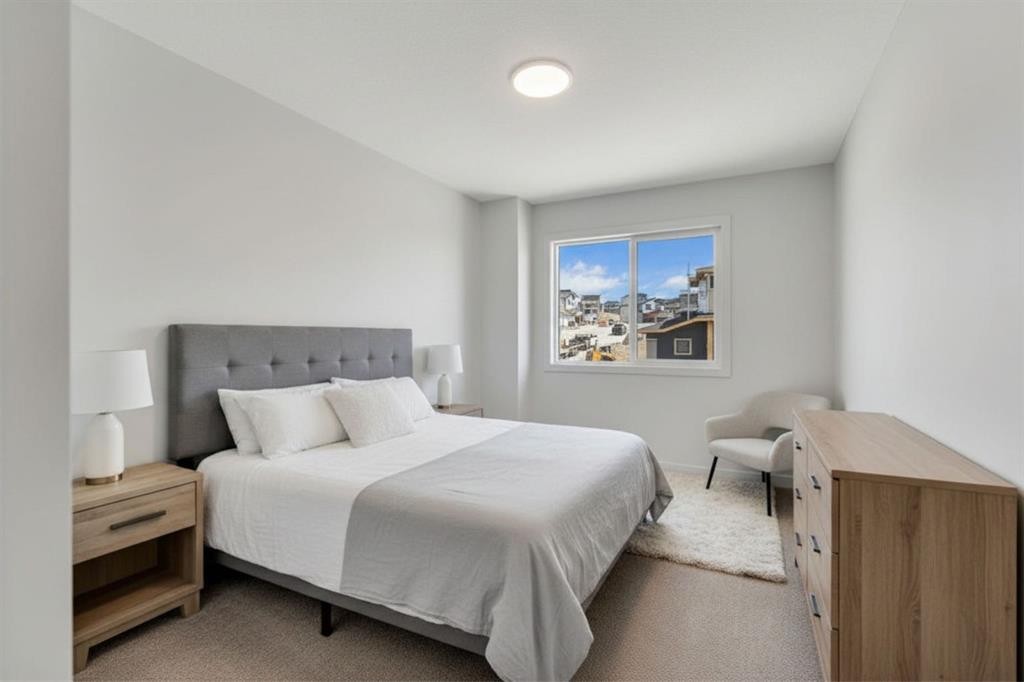 7 Heritage Heath, Cochrane, AB - Indoor Photo Showing Bedroom