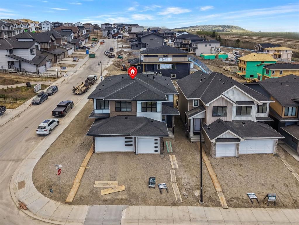 7 Heritage Heath, Cochrane, AB - Outdoor With Facade