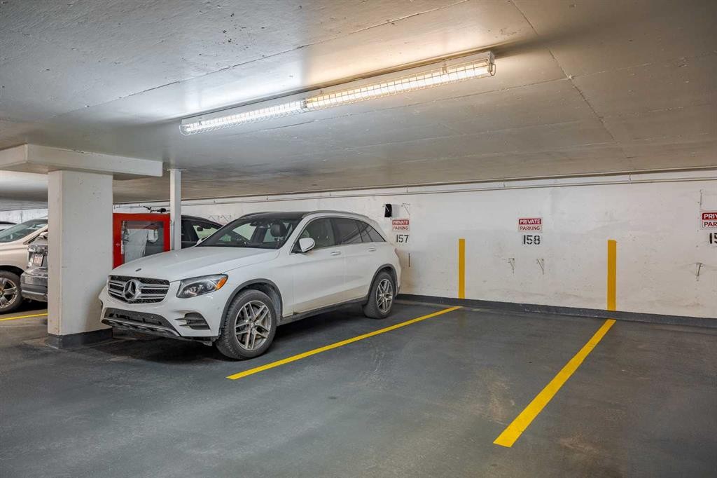 1002-145 Point Drive Nw, Calgary, AB - Indoor Photo Showing Garage