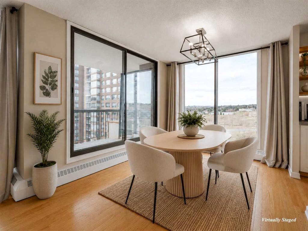 1002-145 Point Drive Nw, Calgary, AB - Indoor Photo Showing Dining Room