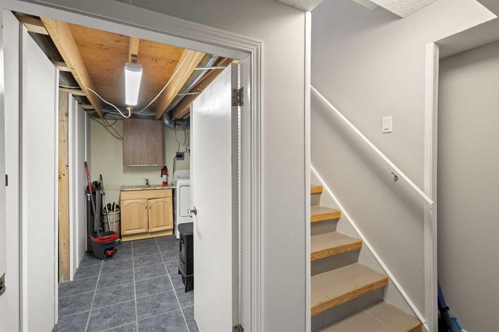 208 Woodpark Place Sw, Calgary, AB - Indoor Photo Showing Other Room