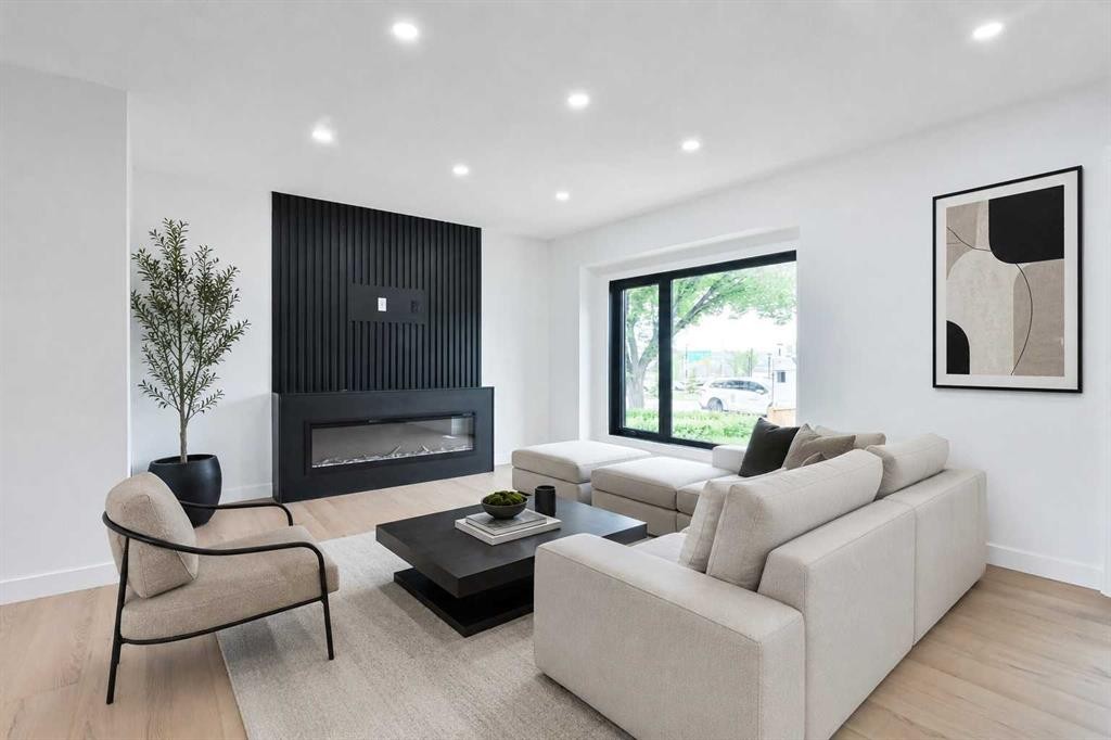 4940 45 Street Sw, Calgary, AB - Indoor Photo Showing Living Room With Fireplace