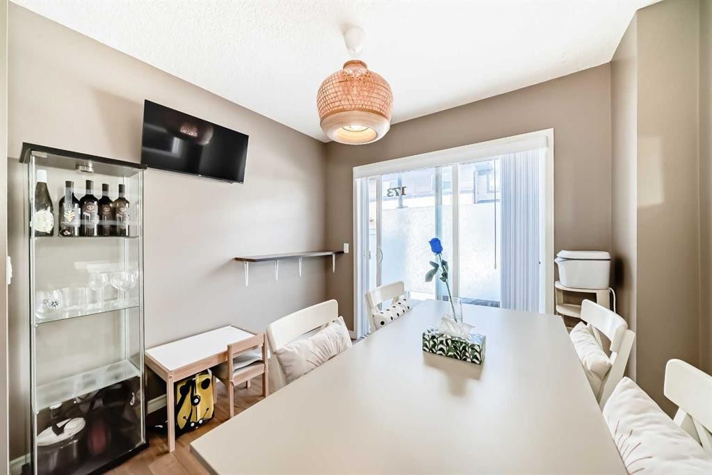 173 Eversyde Common Sw, Calgary, AB - Indoor Photo Showing Dining Room