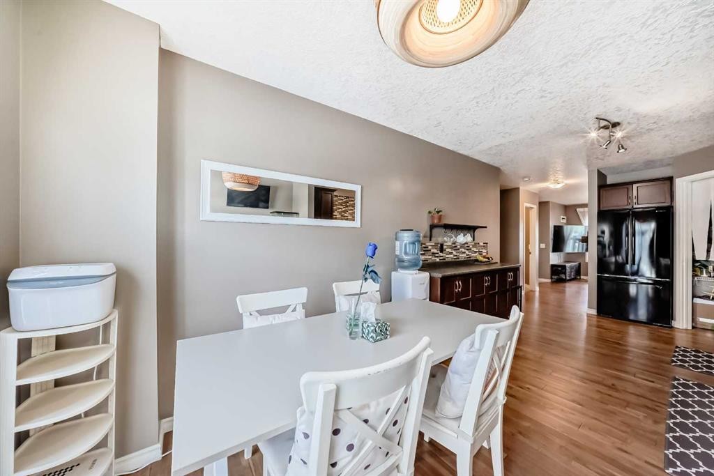 173 Eversyde Common Sw, Calgary, AB - Indoor Photo Showing Dining Room