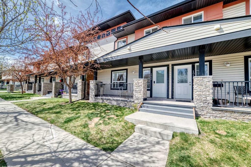 173 Eversyde Common Sw, Calgary, AB - Outdoor With Deck Patio Veranda With Facade