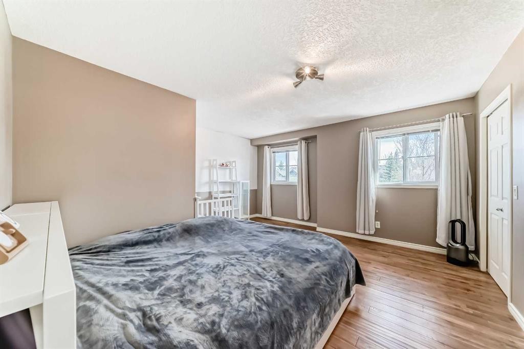 173 Eversyde Common Sw, Calgary, AB - Indoor Photo Showing Bedroom