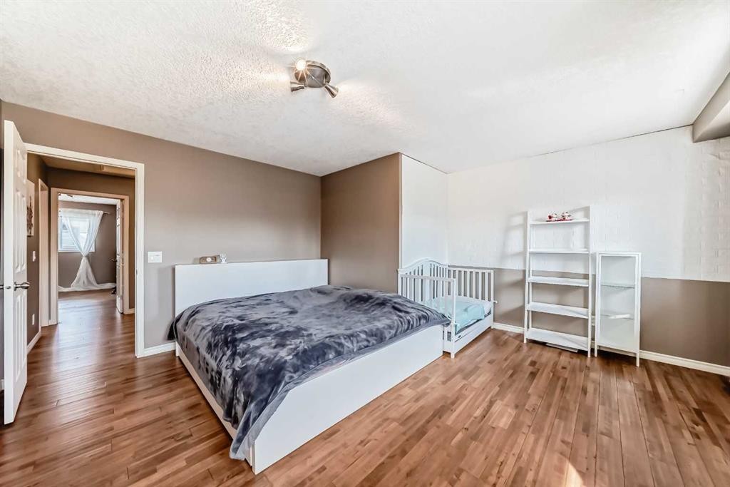 173 Eversyde Common Sw, Calgary, AB - Indoor Photo Showing Bedroom