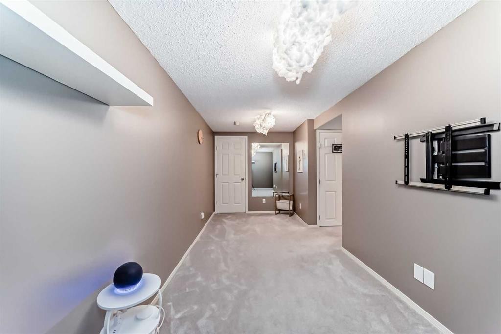 173 Eversyde Common Sw, Calgary, AB - Indoor Photo Showing Other Room