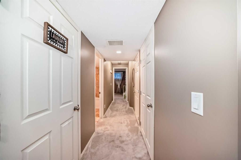 173 Eversyde Common Sw, Calgary, AB - Indoor Photo Showing Other Room
