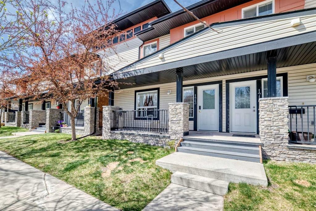 173 Eversyde Common Sw, Calgary, AB - Outdoor With Deck Patio Veranda With Facade