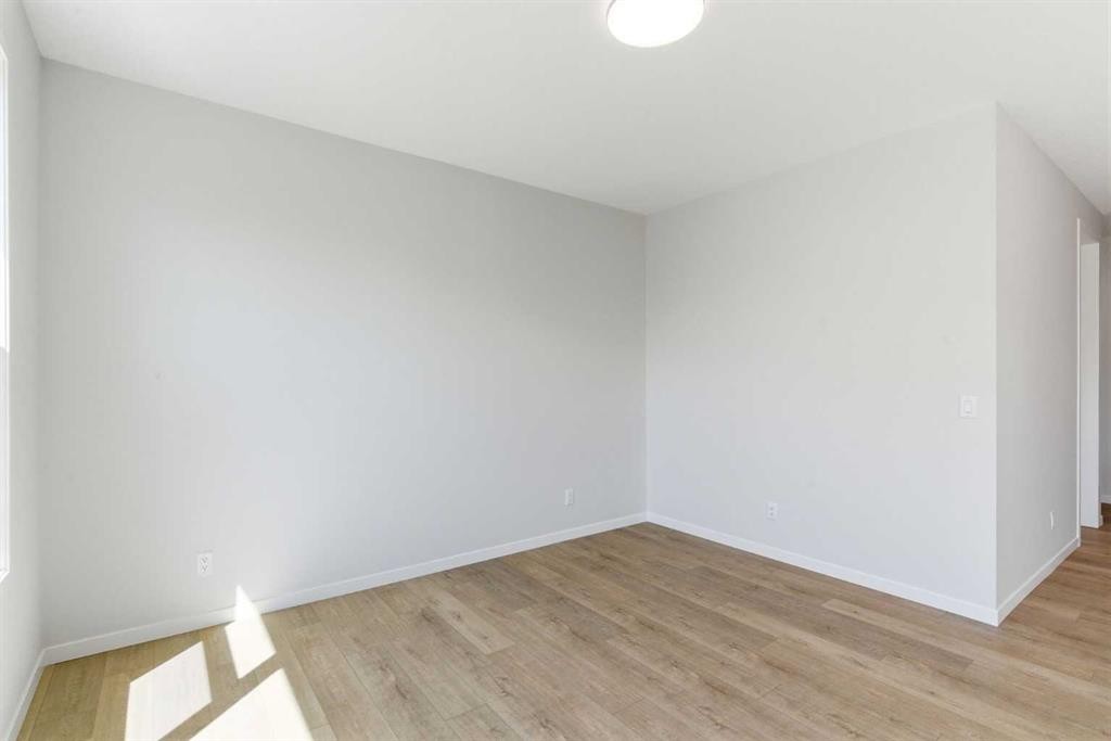 53 Snowberry Common Se, Calgary, AB - Indoor Photo Showing Other Room