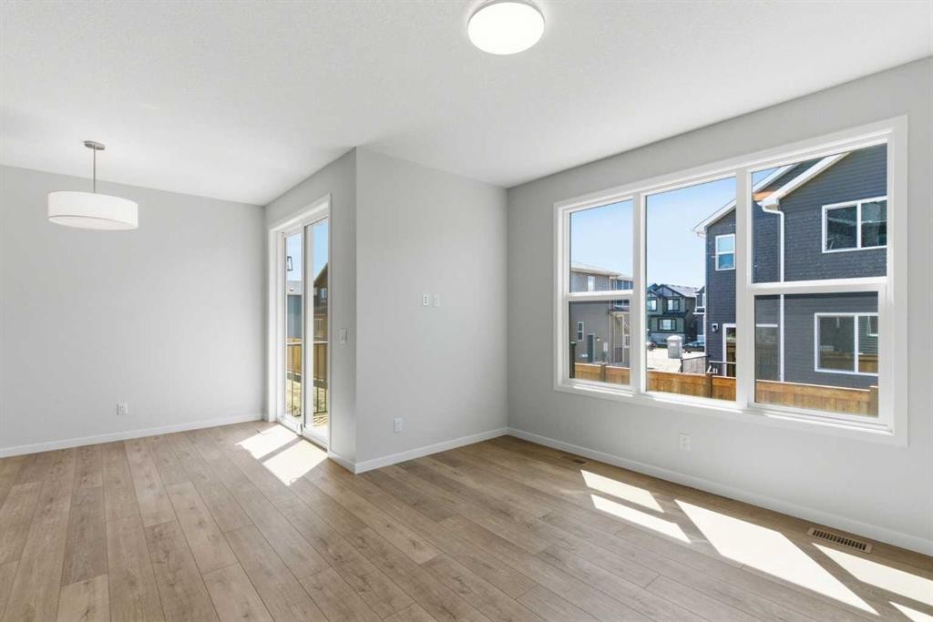 53 Snowberry Common Se, Calgary, AB - Indoor Photo Showing Other Room