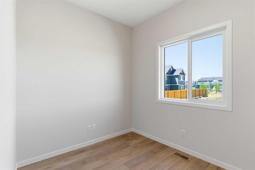 53 Snowberry Common Se, Calgary, AB - Indoor Photo Showing Other Room