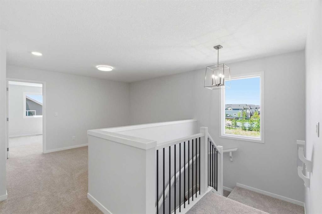 53 Snowberry Common Se, Calgary, AB - Indoor Photo Showing Other Room