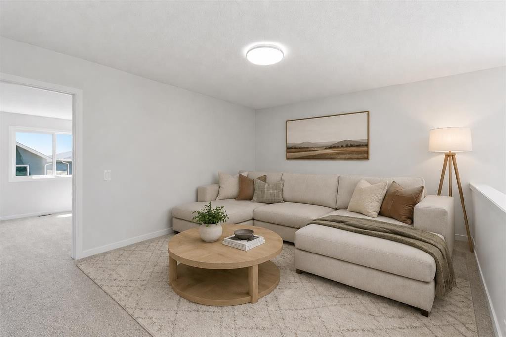 53 Snowberry Common Se, Calgary, AB - Indoor Photo Showing Living Room