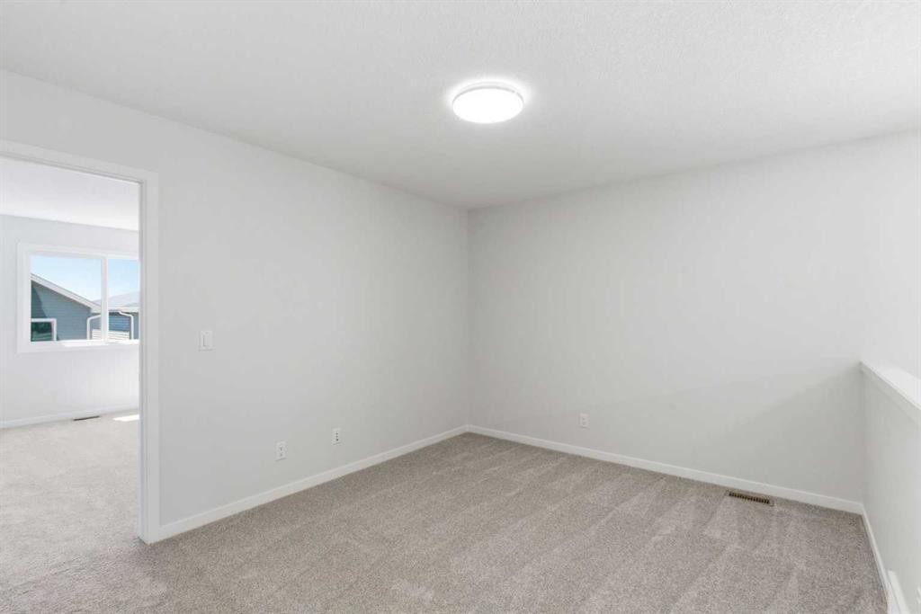 53 Snowberry Common Se, Calgary, AB - Indoor Photo Showing Other Room