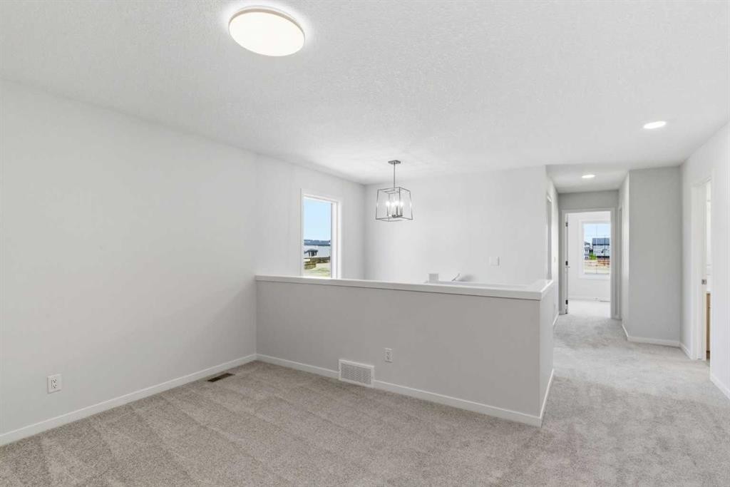 53 Snowberry Common Se, Calgary, AB - Indoor Photo Showing Other Room