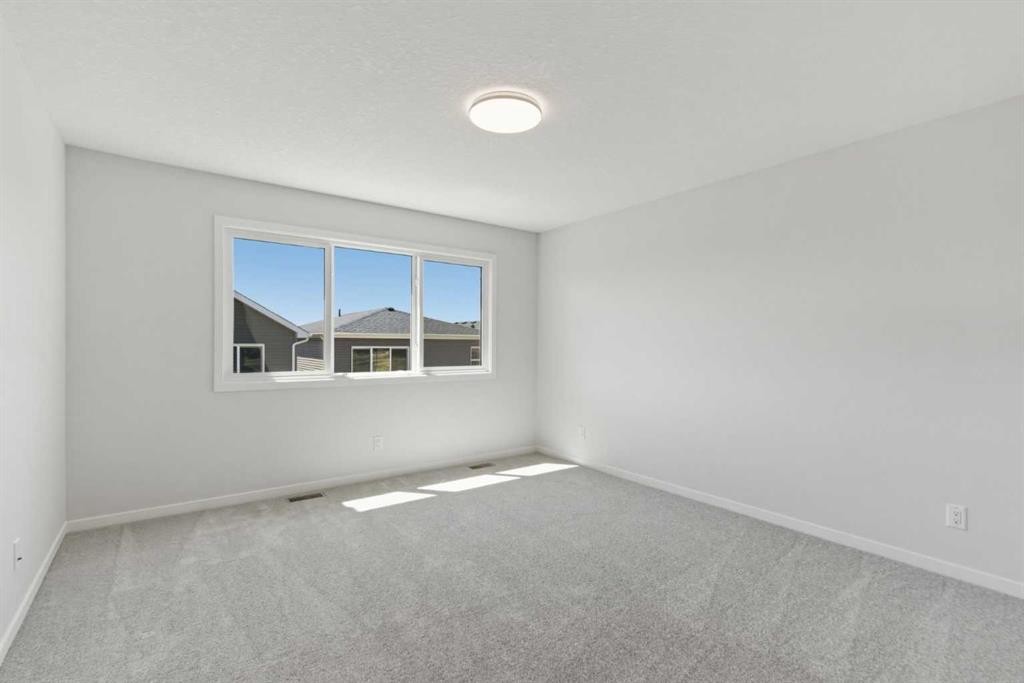 53 Snowberry Common Se, Calgary, AB - Indoor Photo Showing Other Room