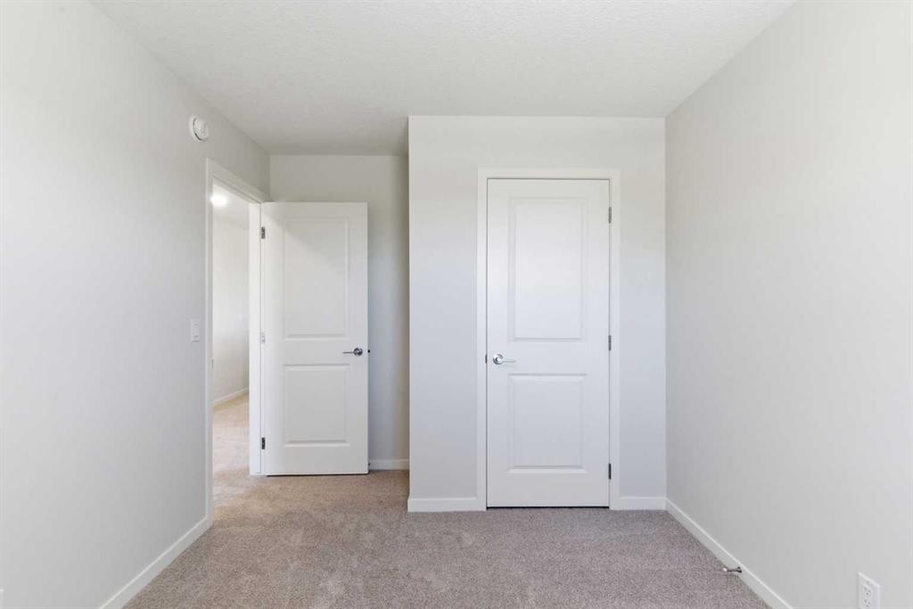 53 Snowberry Common Se, Calgary, AB - Indoor Photo Showing Other Room