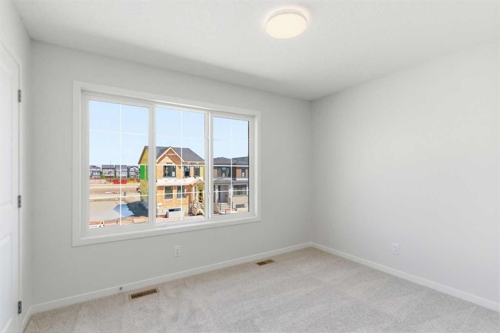 53 Snowberry Common Se, Calgary, AB - Indoor Photo Showing Other Room