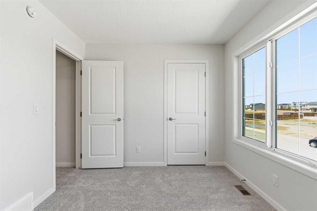 53 Snowberry Common Se, Calgary, AB - Indoor Photo Showing Other Room