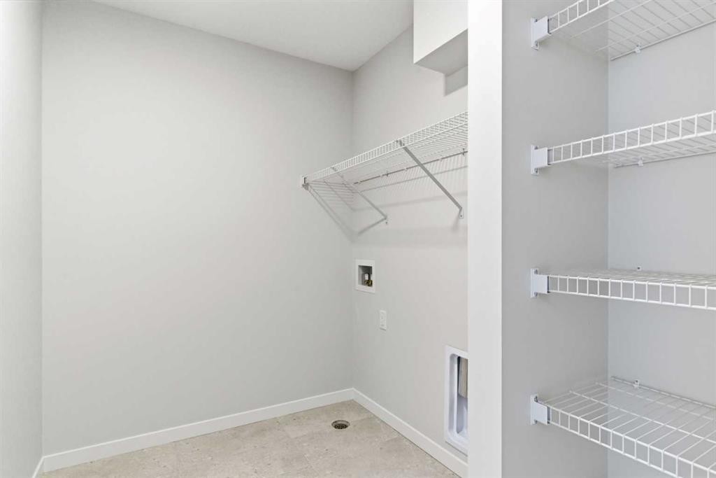 53 Snowberry Common Se, Calgary, AB - Indoor With Storage