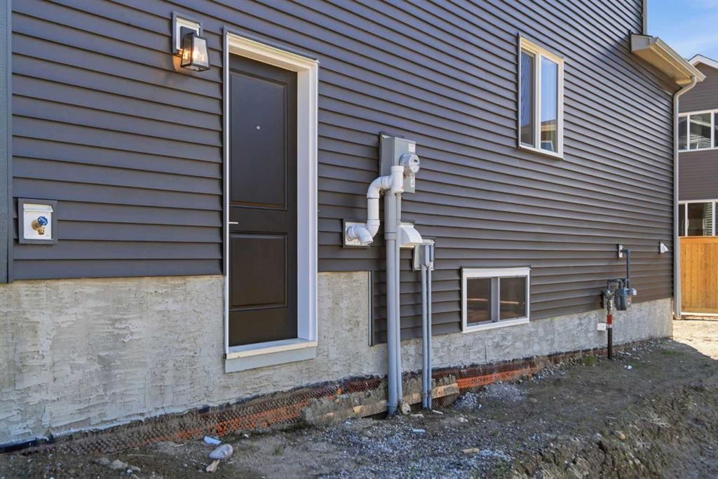 53 Snowberry Common Se, Calgary, AB - Outdoor With Exterior