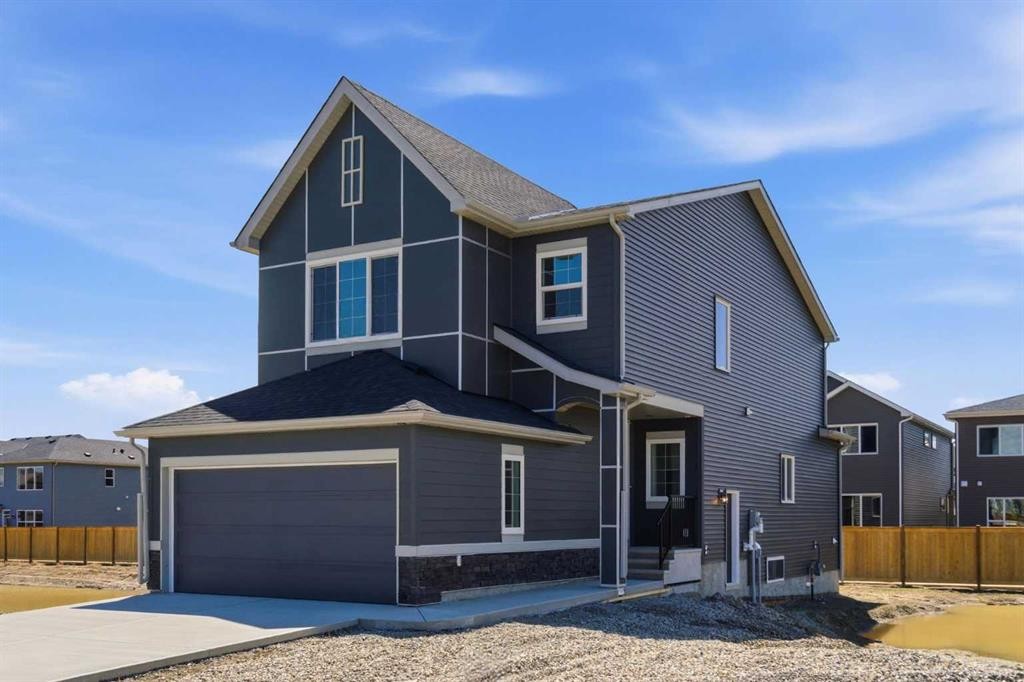 53 Snowberry Common Se, Calgary, AB - Outdoor
