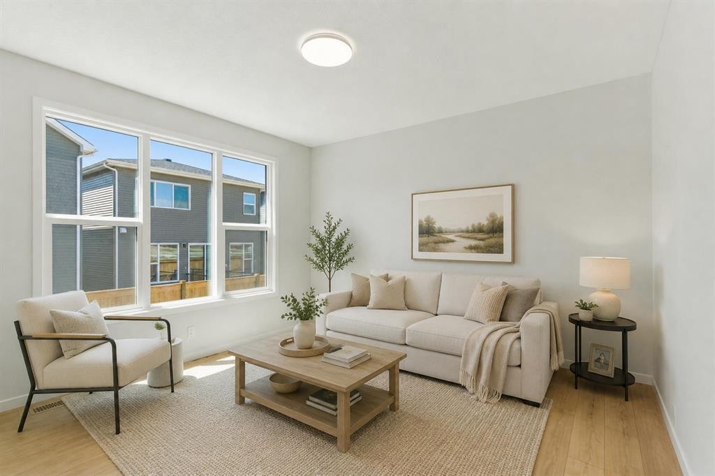 53 Snowberry Common Se, Calgary, AB - Indoor Photo Showing Living Room