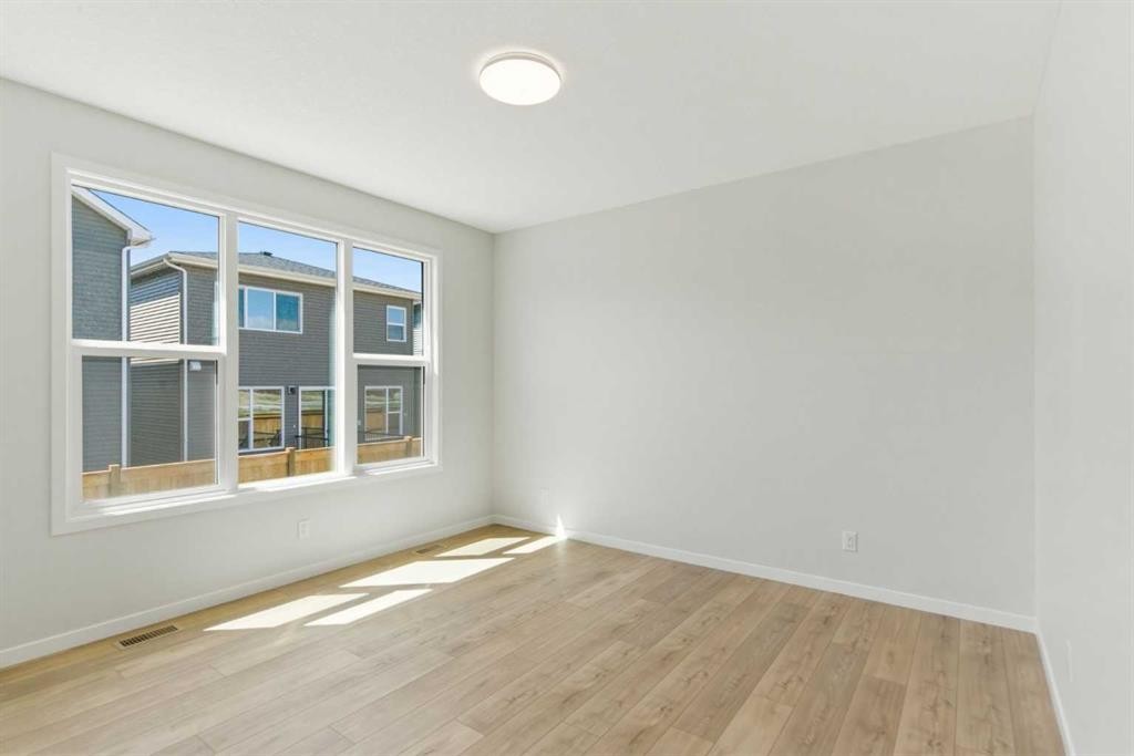 53 Snowberry Common Se, Calgary, AB - Indoor Photo Showing Other Room