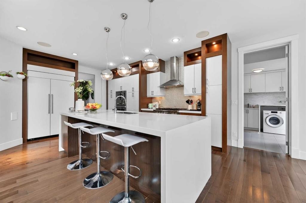 168 Posthill Drive Sw, Calgary, AB - Indoor Photo Showing Kitchen With Upgraded Kitchen