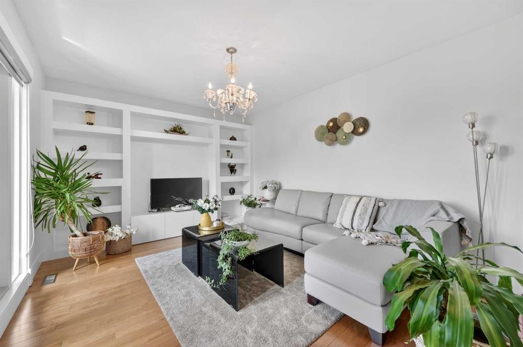 168 Posthill Drive Sw, Calgary, AB - Indoor Photo Showing Living Room