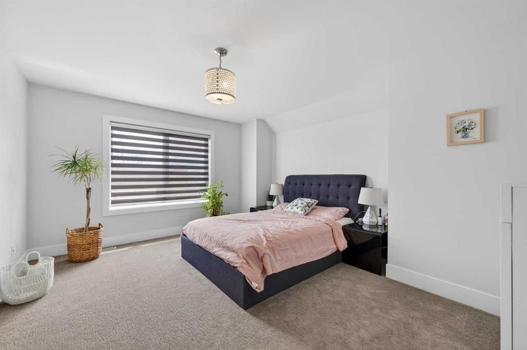 168 Posthill Drive Sw, Calgary, AB - Indoor Photo Showing Bedroom