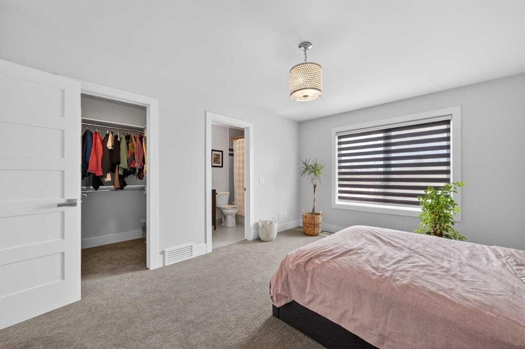 168 Posthill Drive Sw, Calgary, AB - Indoor Photo Showing Bedroom