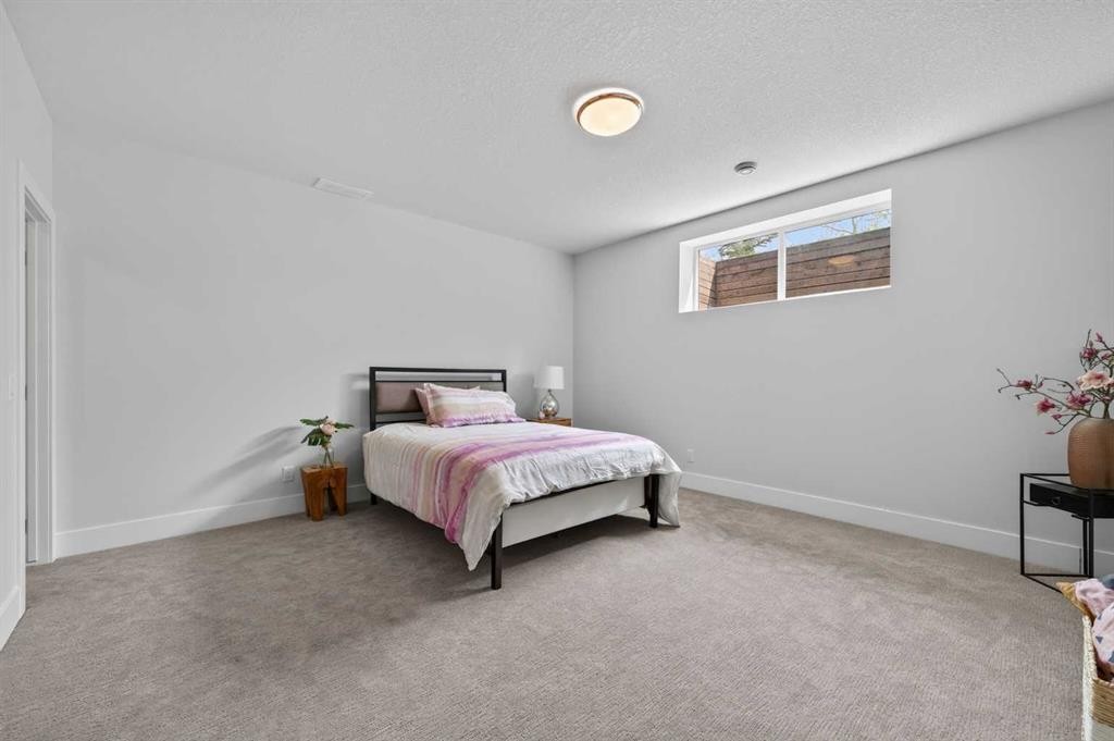 168 Posthill Drive Sw, Calgary, AB - Indoor Photo Showing Bedroom