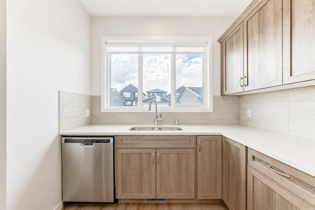 571 Seton Circle Se, Calgary, AB - Indoor Photo Showing Kitchen With Double Sink
