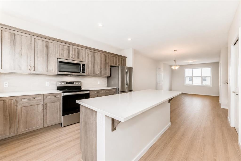571 Seton Circle Se, Calgary, AB - Indoor Photo Showing Kitchen With Stainless Steel Kitchen