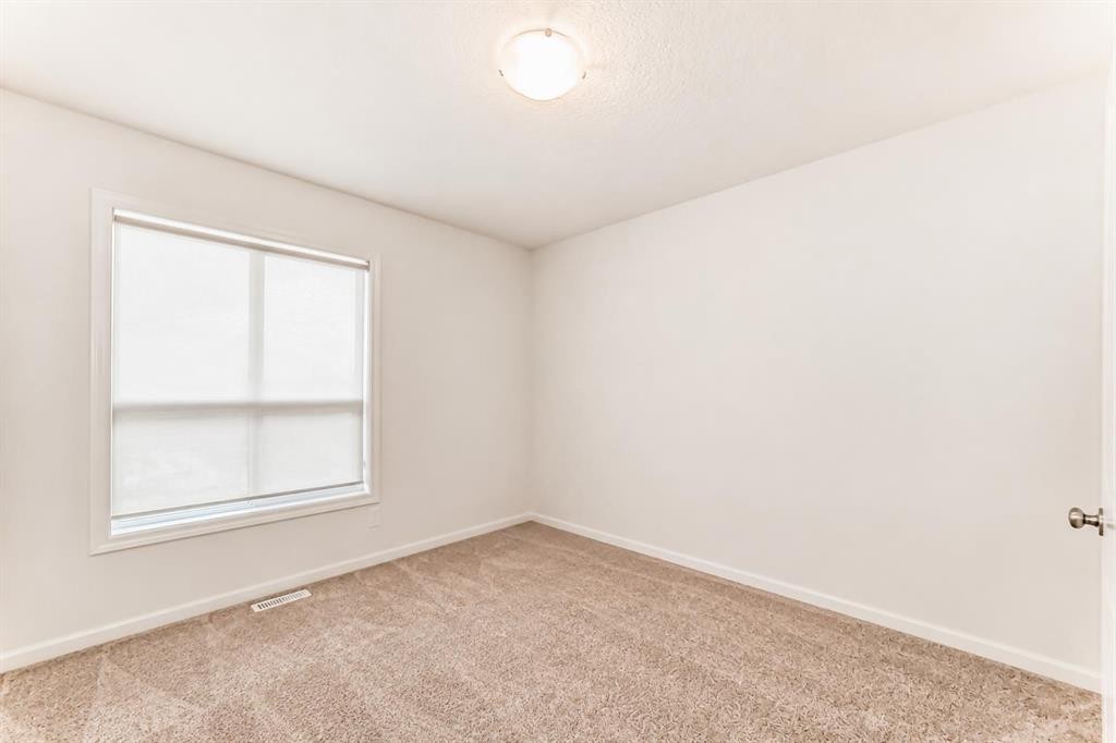 571 Seton Circle Se, Calgary, AB - Indoor Photo Showing Other Room