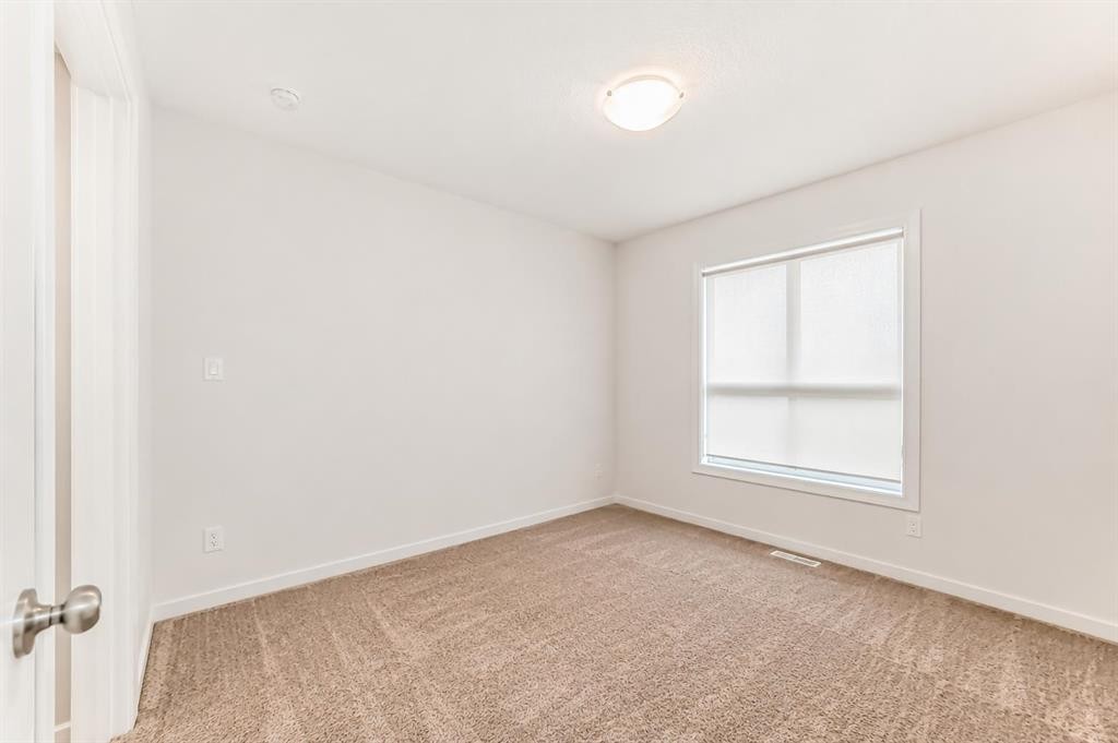 571 Seton Circle Se, Calgary, AB - Indoor Photo Showing Other Room
