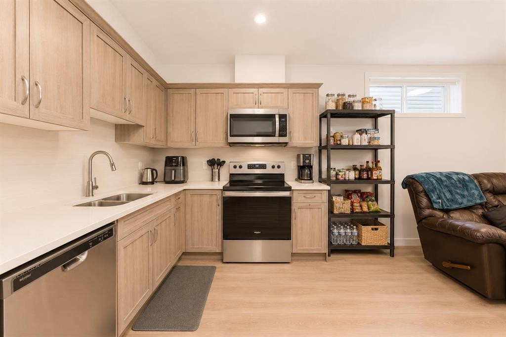 571 Seton Circle Se, Calgary, AB - Indoor Photo Showing Kitchen With Stainless Steel Kitchen With Double Sink