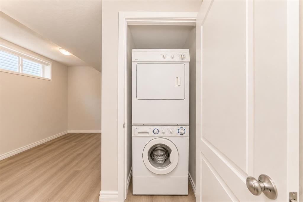 571 Seton Circle Se, Calgary, AB - Indoor Photo Showing Laundry Room