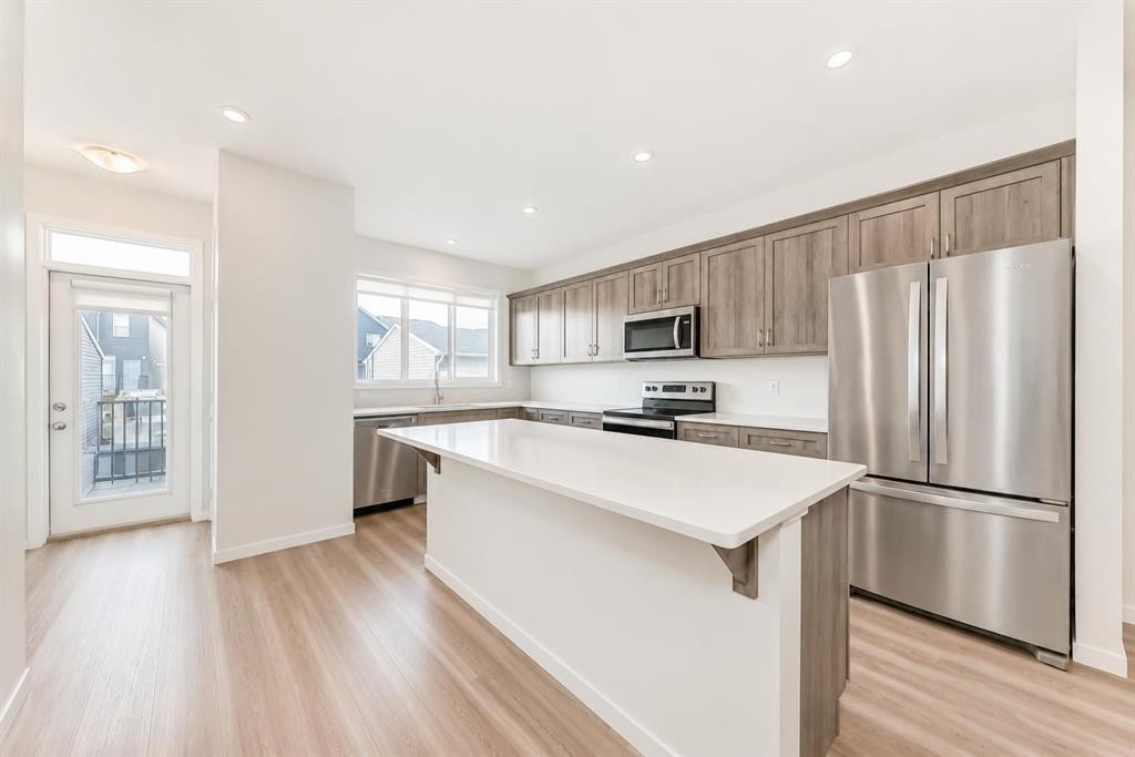 571 Seton Circle Se, Calgary, AB - Indoor Photo Showing Kitchen With Stainless Steel Kitchen