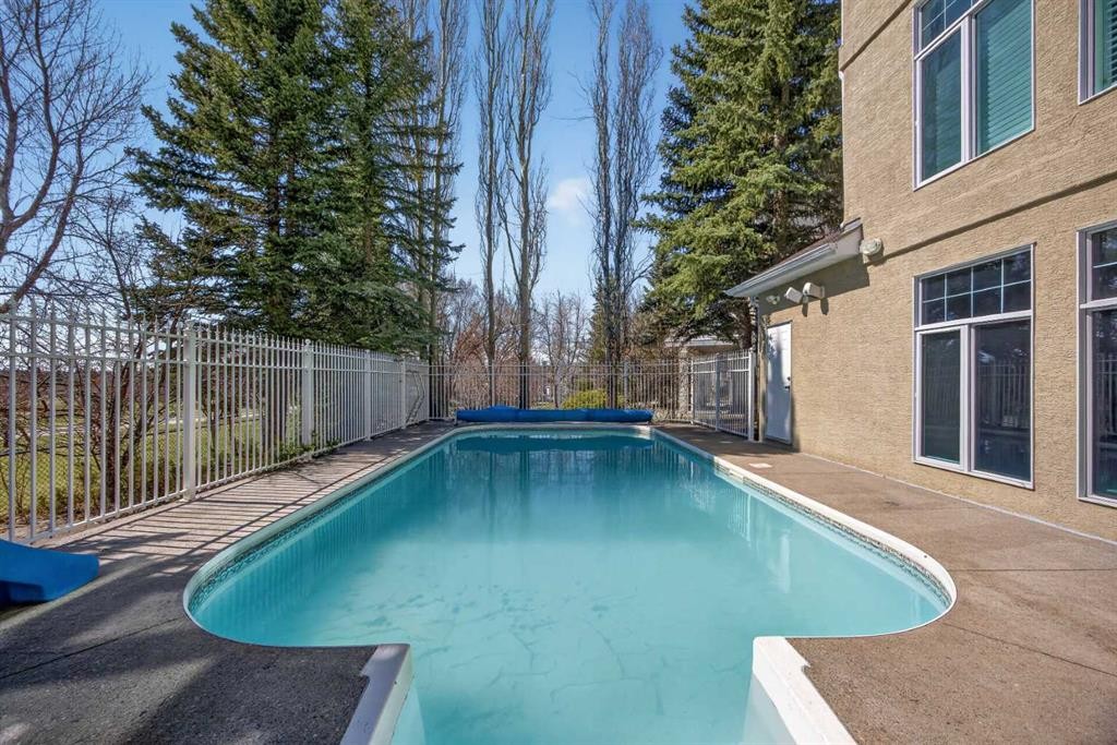 216 Evergreen Heath Sw, Calgary, AB - Outdoor With In Ground Pool