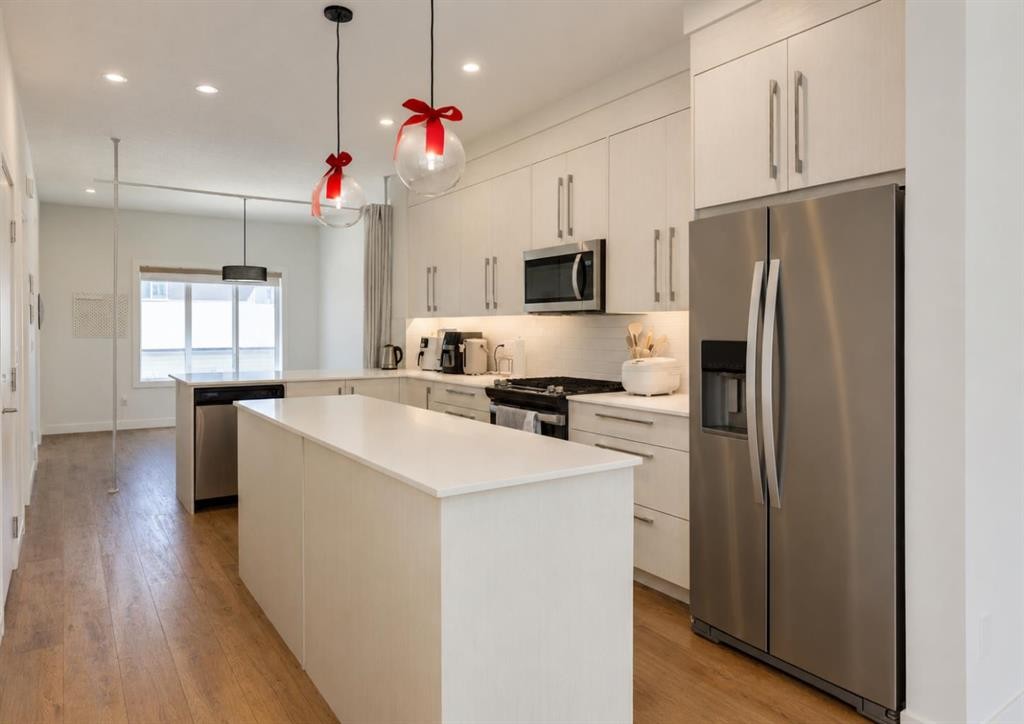 7386 202 Avenue Se, Calgary, AB - Indoor Photo Showing Kitchen With Upgraded Kitchen