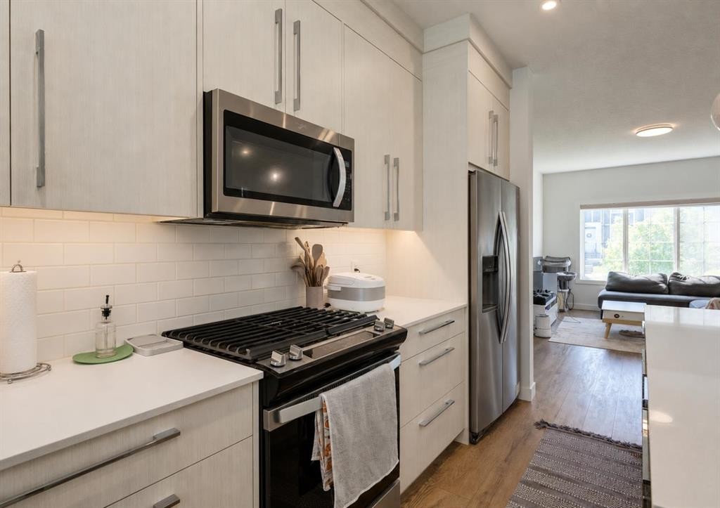 7386 202 Avenue Se, Calgary, AB - Indoor Photo Showing Kitchen With Upgraded Kitchen