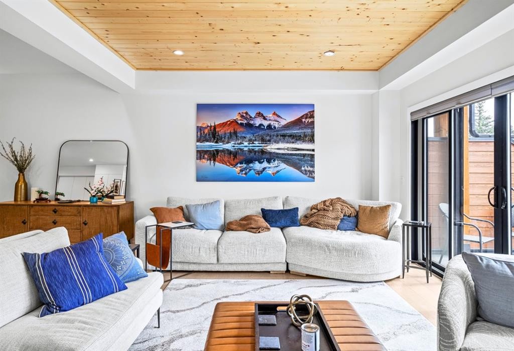 1-826 7Th Street, Canmore, AB - Indoor Photo Showing Living Room