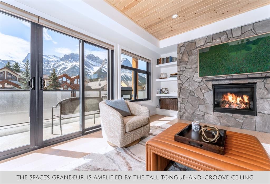 1-826 7Th Street, Canmore, AB - Indoor Photo Showing Living Room With Fireplace